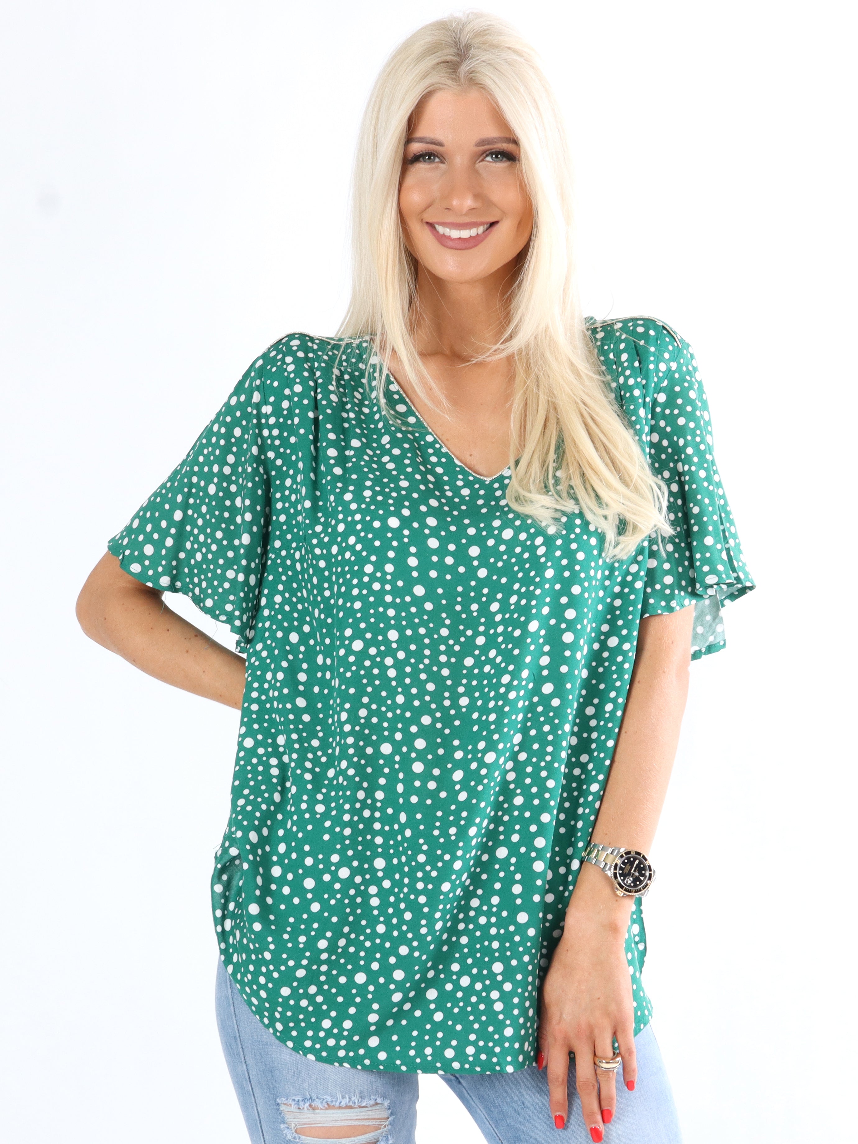 Leslie - Svart blus med prickar och söta ärmar